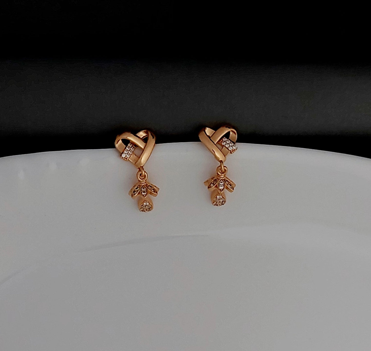 Rosegold earrings,studs,earrings for women,tops for women,latest earring,partywear stud earring