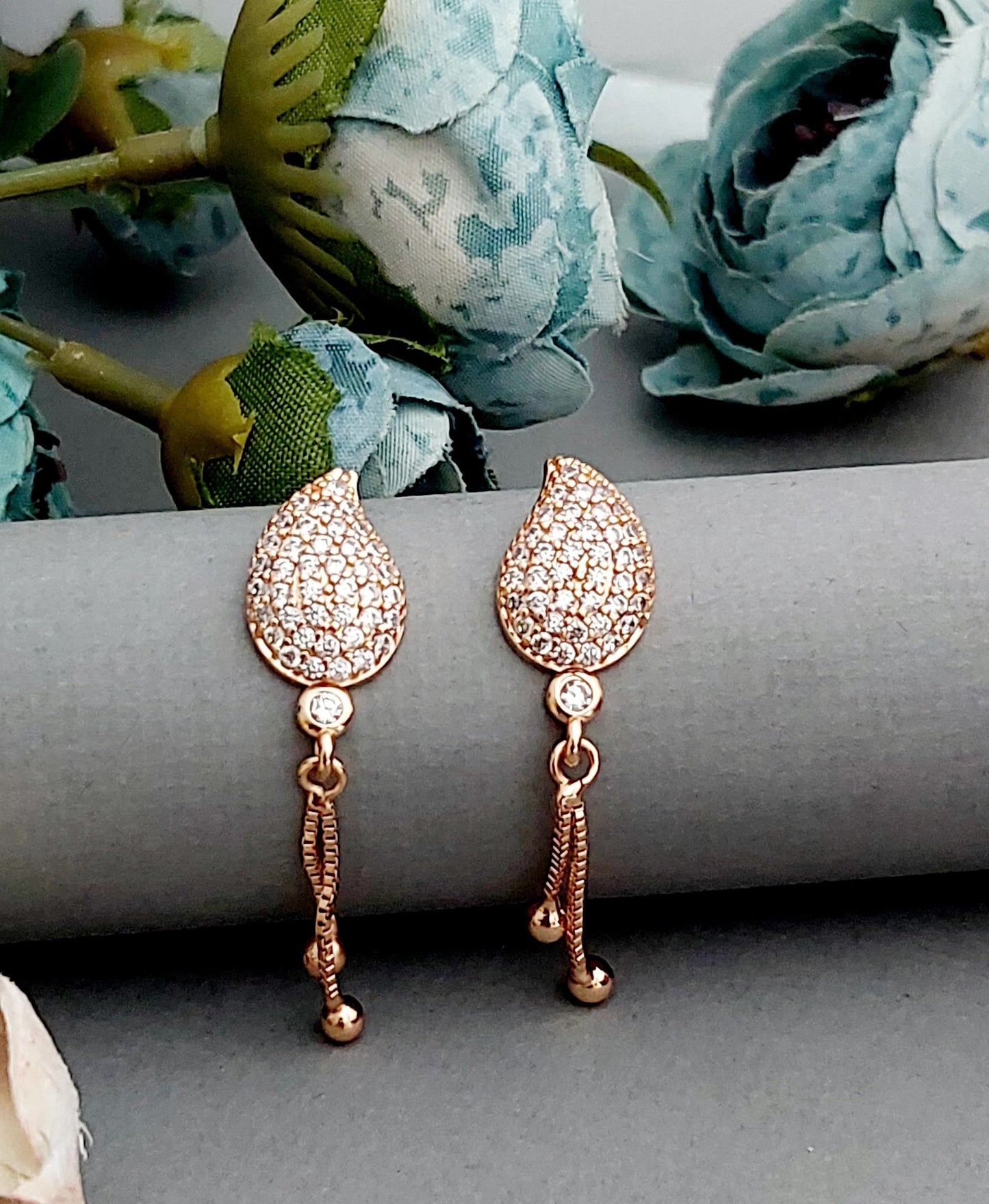 Rosegold earrings,studs,earrings for women,tops for women,latest earring,partywear stud earring
