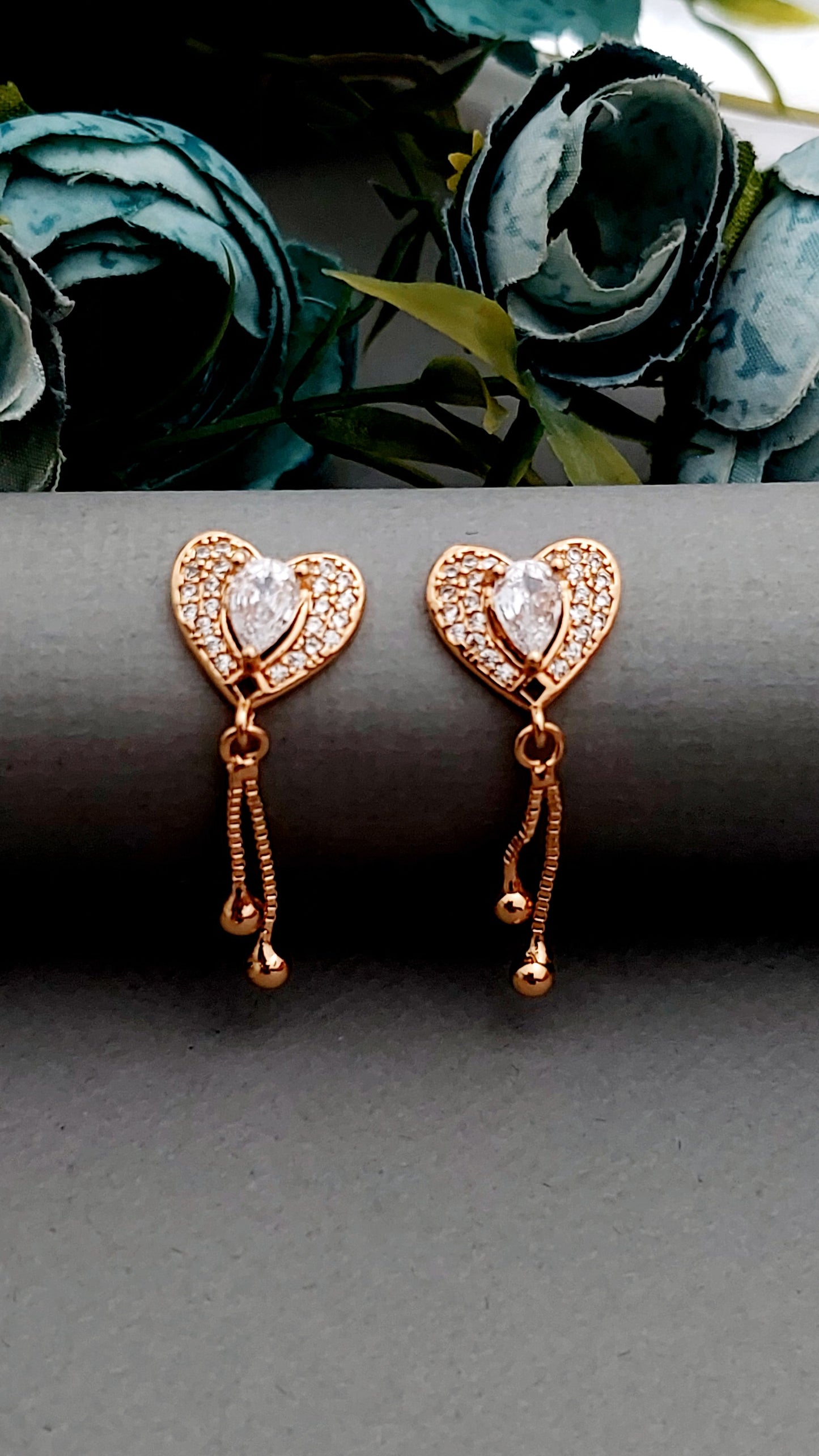Rosegold earrings,studs,earrings for women,tops for women,latest earring,partywear stud earring