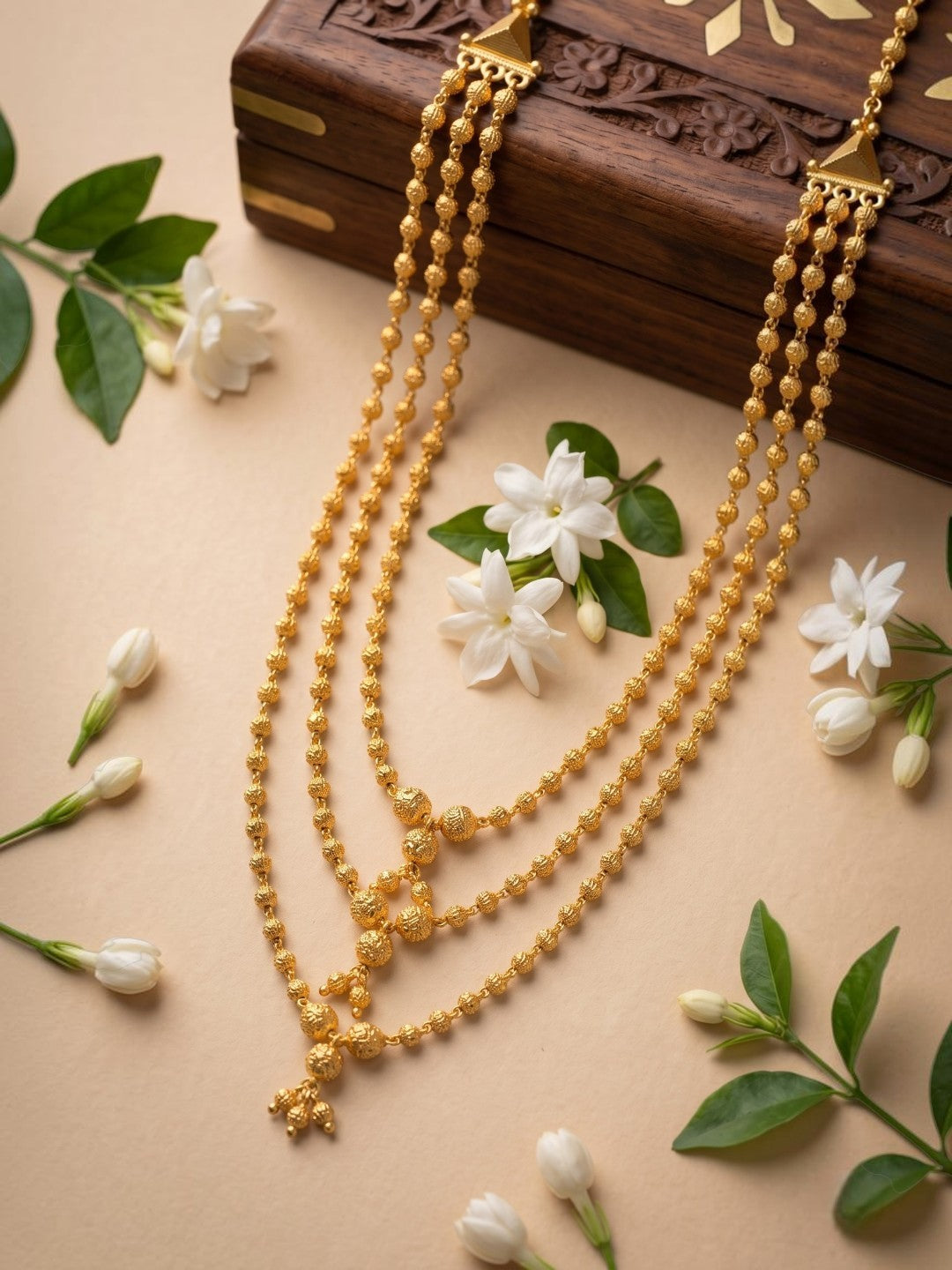 Traditional Gold-Toned Layered Beaded Ethnic Necklace with Dangling Charm Details for Women