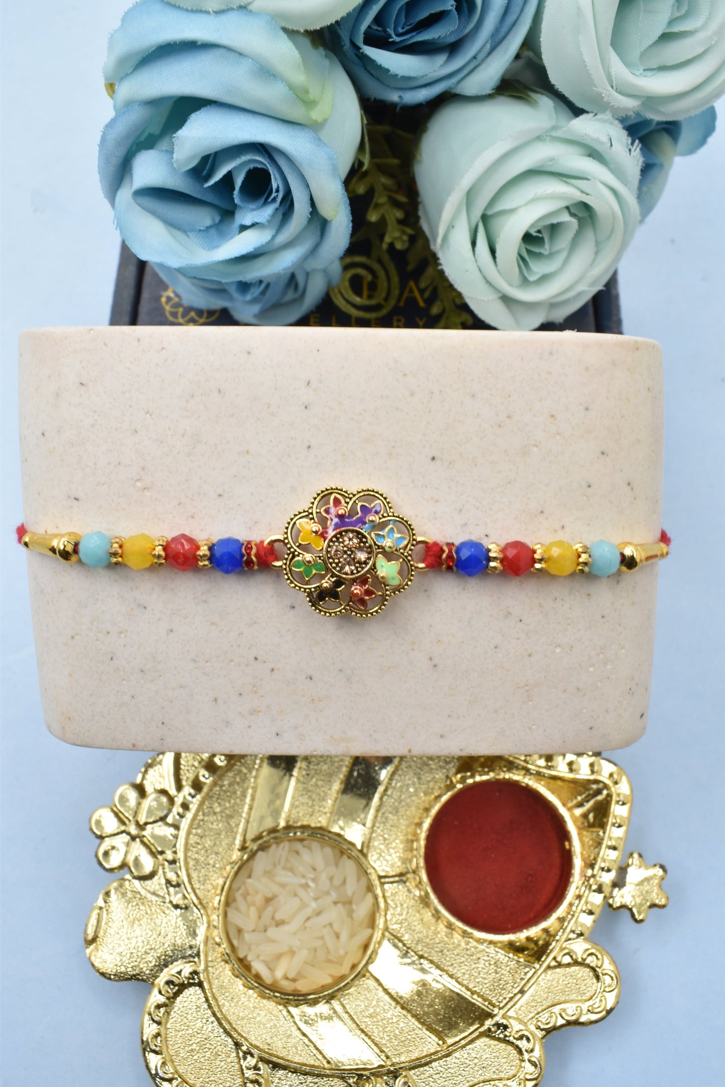 दिव्य फूल पैटर्न वाली मीनाकारी राखी1 रोली चावल और रक्षाबंधन ग्रीटिंग कार्ड के पैक के साथ सूती धागों से बनी राखी | भाई के लिए राखी|भैया राखी | बच्चों की राखी | बच्चों के लिए राखी | भैया के लिए राखी