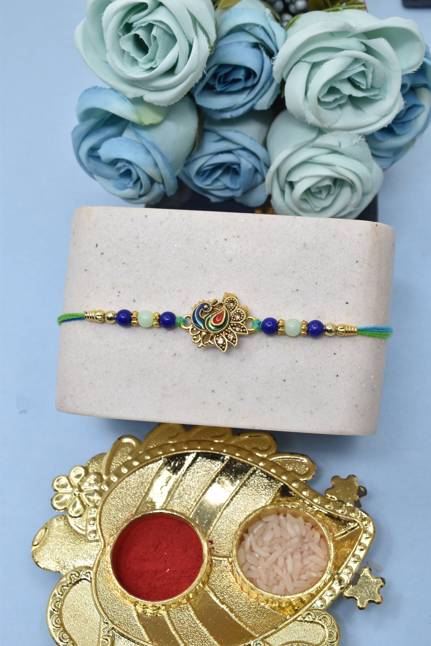 Elegent Round Peacock on Morpaankh Goldplated Kundan Stone Multicolored Rakhis 1 Rakhi Made from Cotton Threds with Pack of Roli Chawal n Rakshabandhan Greetings Card |rakhi for brother|Bhaiya Rakhi | Kids rakhi |Rakhi for kids|Rakhi for Bhaiya