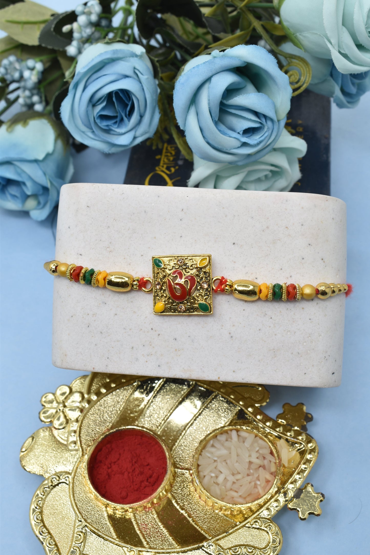 Spiritual OM Square shapes Divine Goldplated Multicolored Rakhis 1 Rakhi Made from Cotton Threds with Pack of Roli Chawal n Rakshabandhan Greetings Card |rakhi for brother|Bhaiya Rakhi | Kids rakhi |Rakhi for kids|Rakhi for Bhaiya