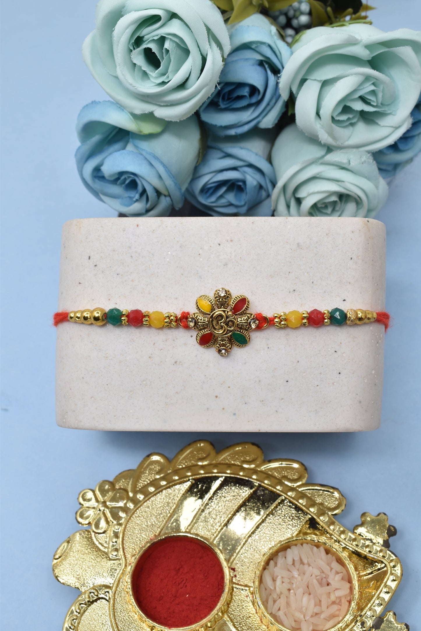 Flower OM With Morpankh Divine Goldplated Multicolored Rakhis 1 Rakhi Made from Cotton Threds with Pack of Roli Chawal n Rakshabandhan Greetings Card |rakhi for brother|Bhaiya Rakhi | Kids rakhi |Rakhi for kids|Rakhi for Bhaiya