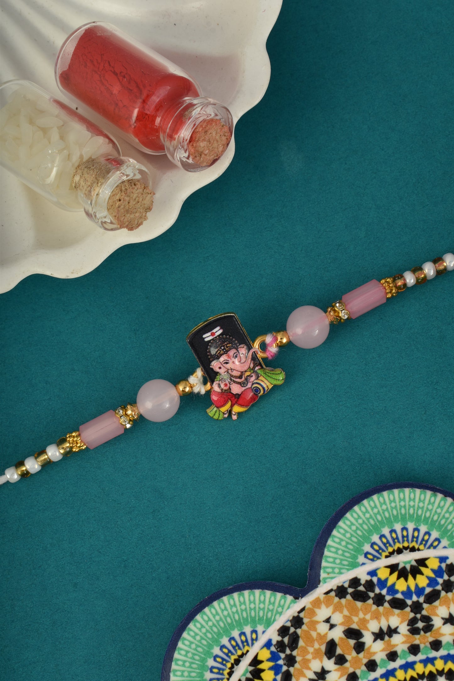 Cute Ganesha Design Pink Kids Rakhi
