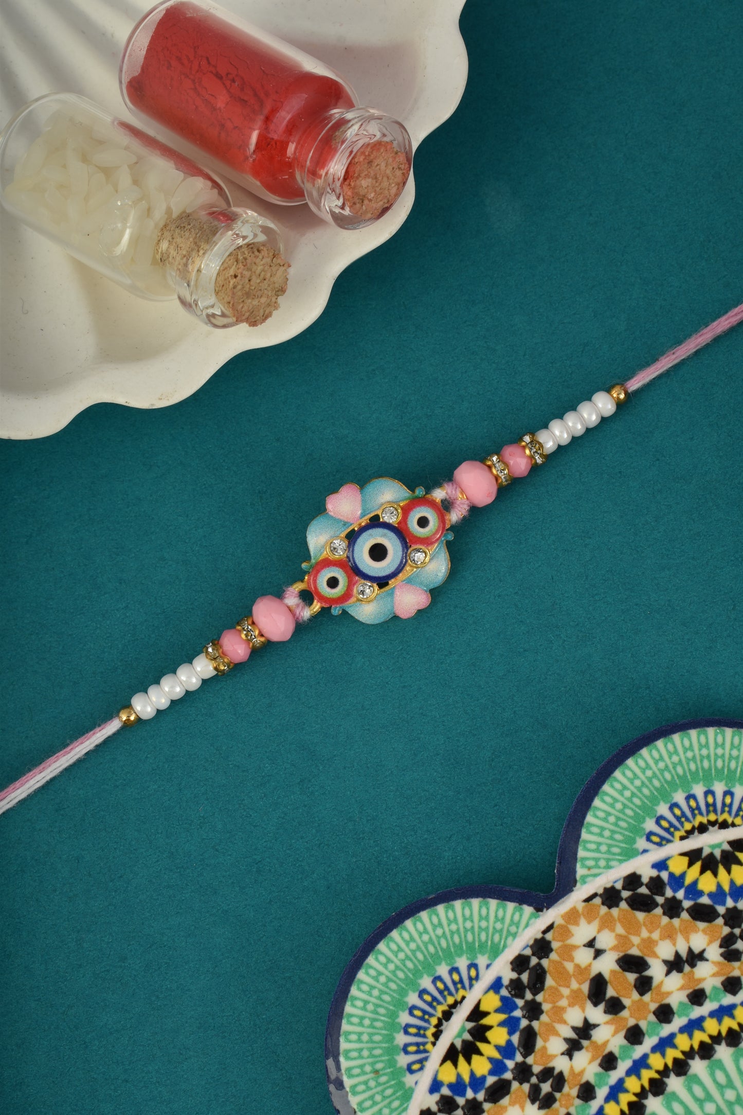 Evil Eye Design Pink Blue Rakhi for Brother