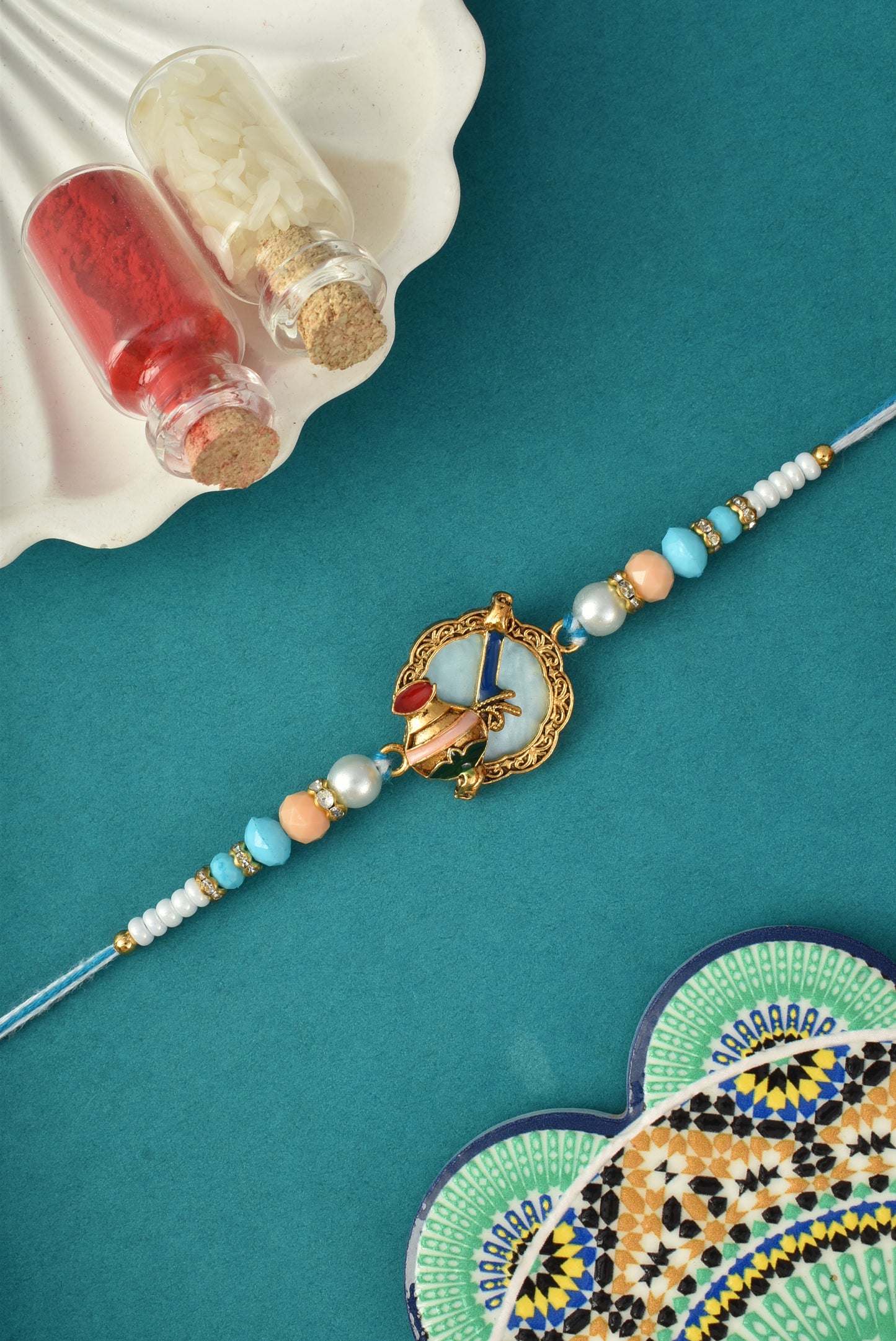 Unique Matka Design Blue Rakhi for Brother