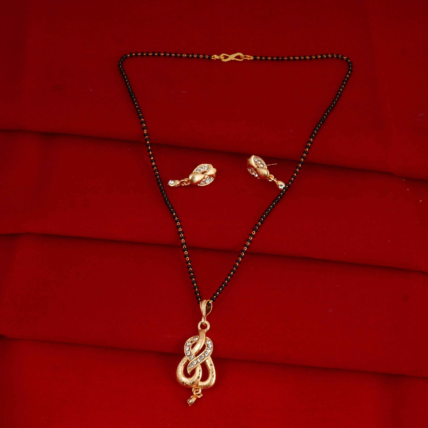 Indian Jewellery from Meira Jewellery:Mangalsutra,Rose Gold plated trendy Mangalsutra with black beads