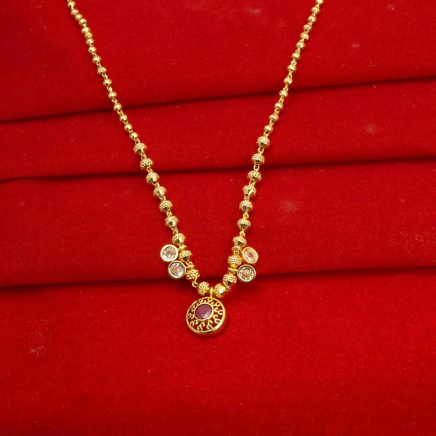 Designer Gold Plated Round shape pink color pendant Neckwear.