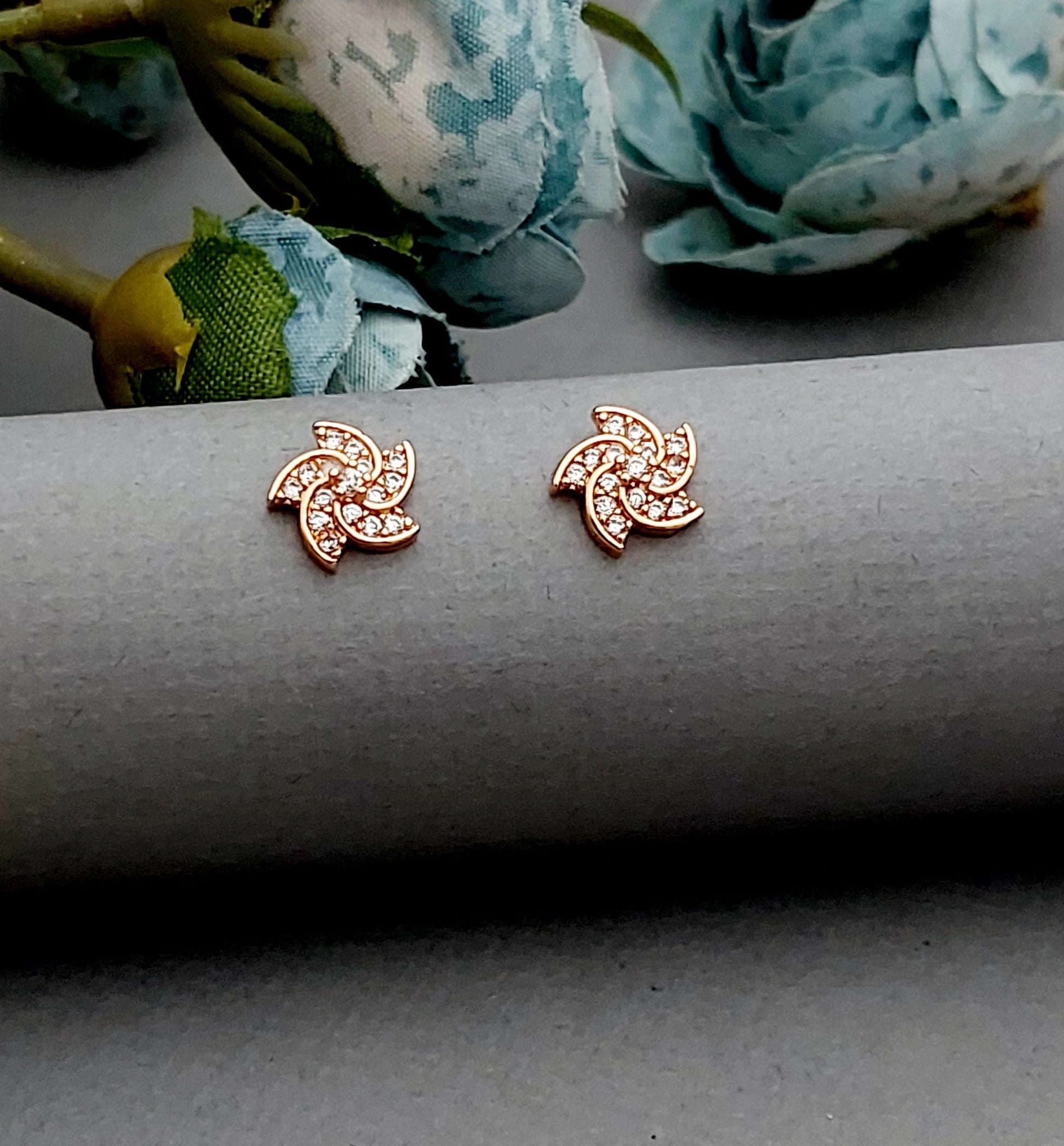 Rosegold earrings,studs,earrings for women,tops for women,latest earring,partywear stud earring
