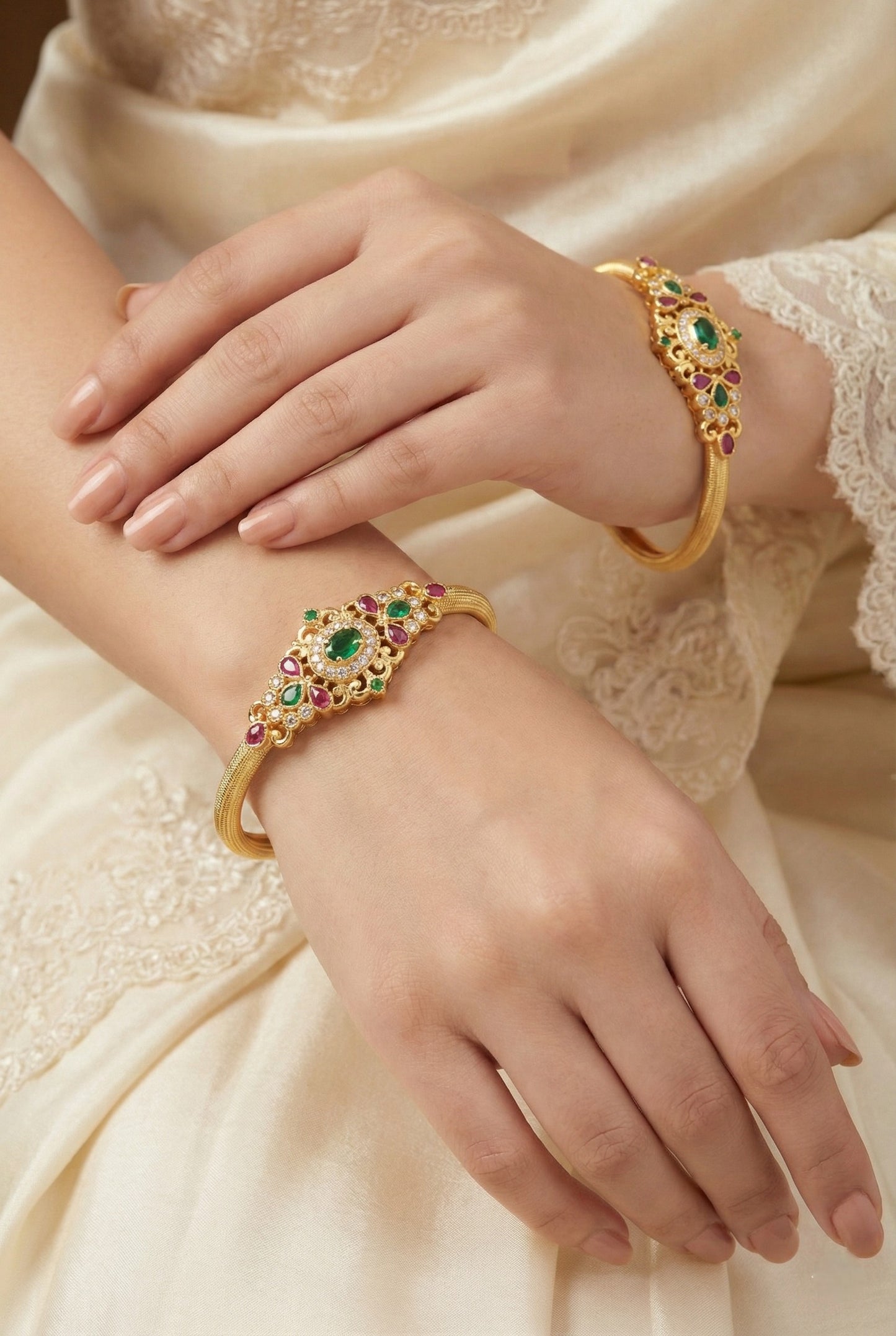 Traditional Gold Finish Stone Studded Kada Bangles with Oval Motif and Temple Inspired Detailing for Women