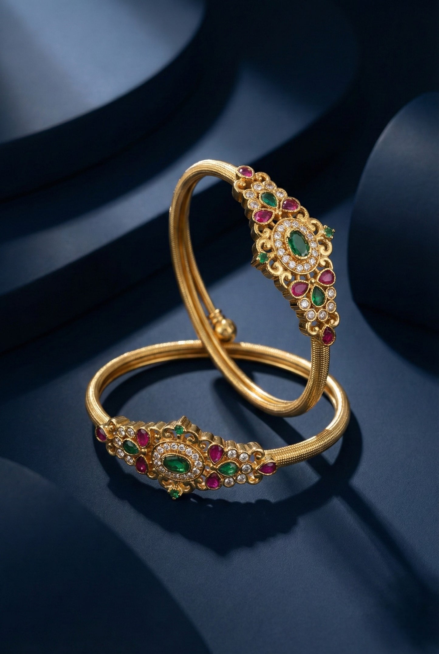 Traditional Gold Finish Stone Studded Kada Bangles with Oval Motif and Temple Inspired Detailing for Women