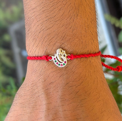 Cosmic Sync – Ganesh OM Thread 925 Silver Rakhi