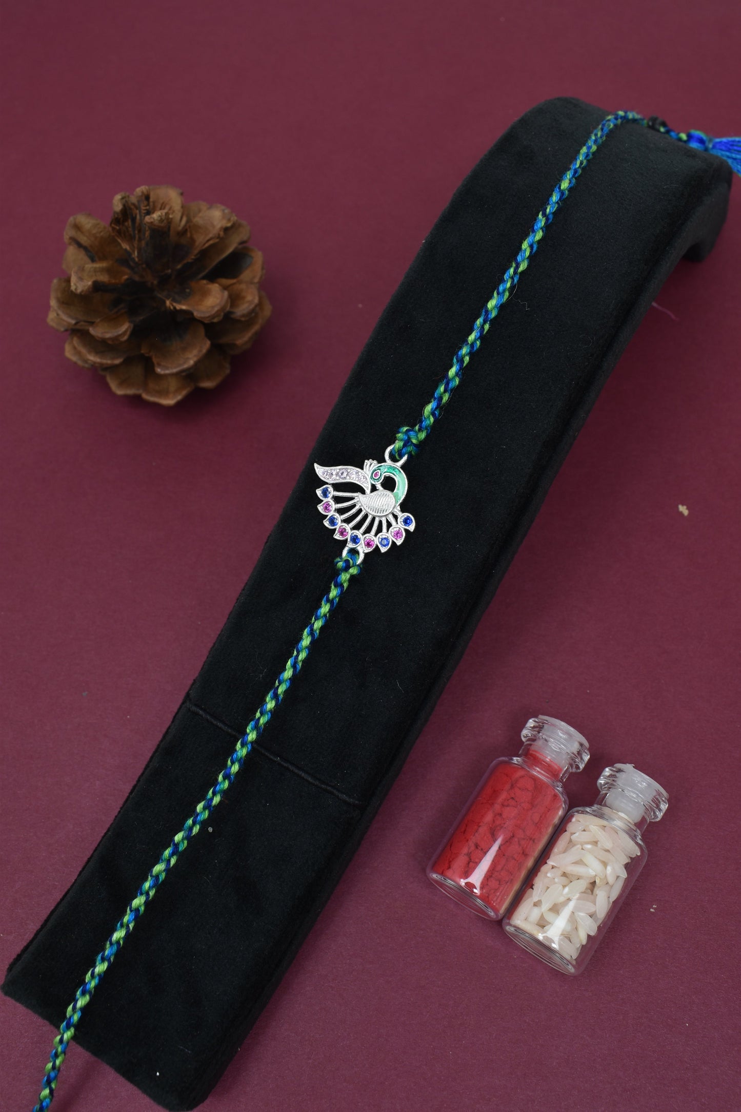  Feathered Grace – Peacock Ties Rakhi           