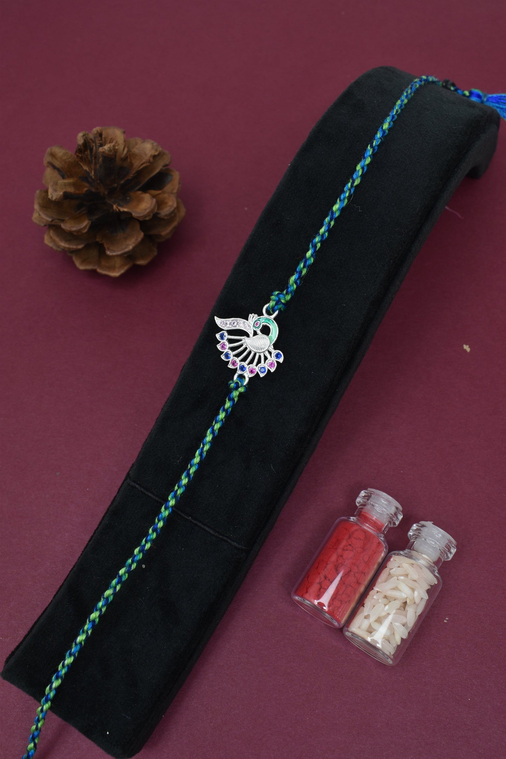  Feathered Grace – Peacock Ties Rakhi           