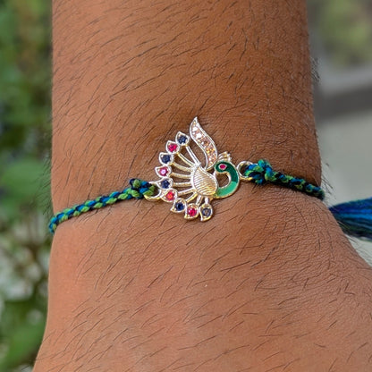 Feathered Grace – Peacock Ties Rakhi 925 Silver Rakhi