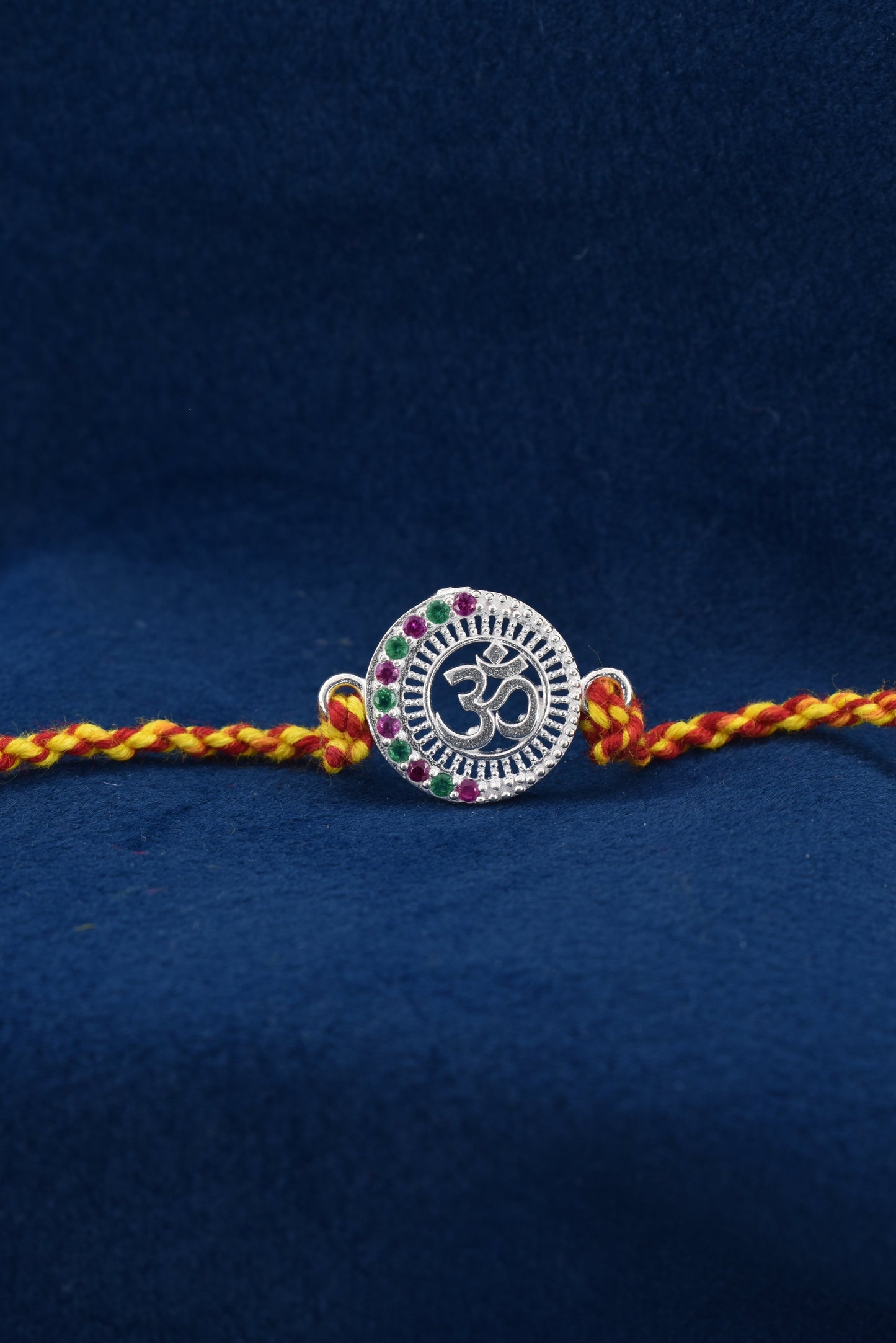 Timeless bond, OM blessed 925 Silver Rakhi.