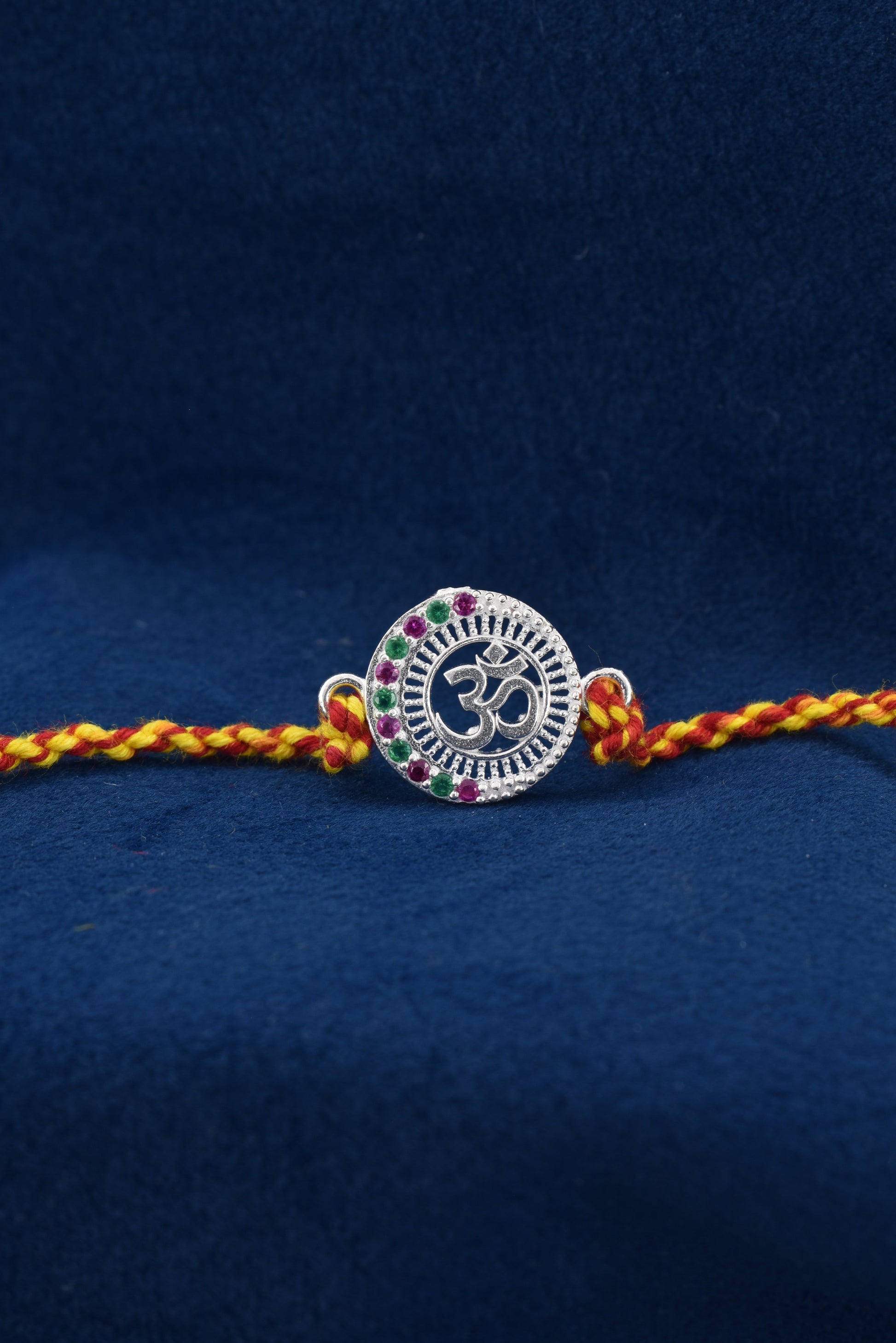 Timeless bond, OM blessed 925 Silver Rakhi.