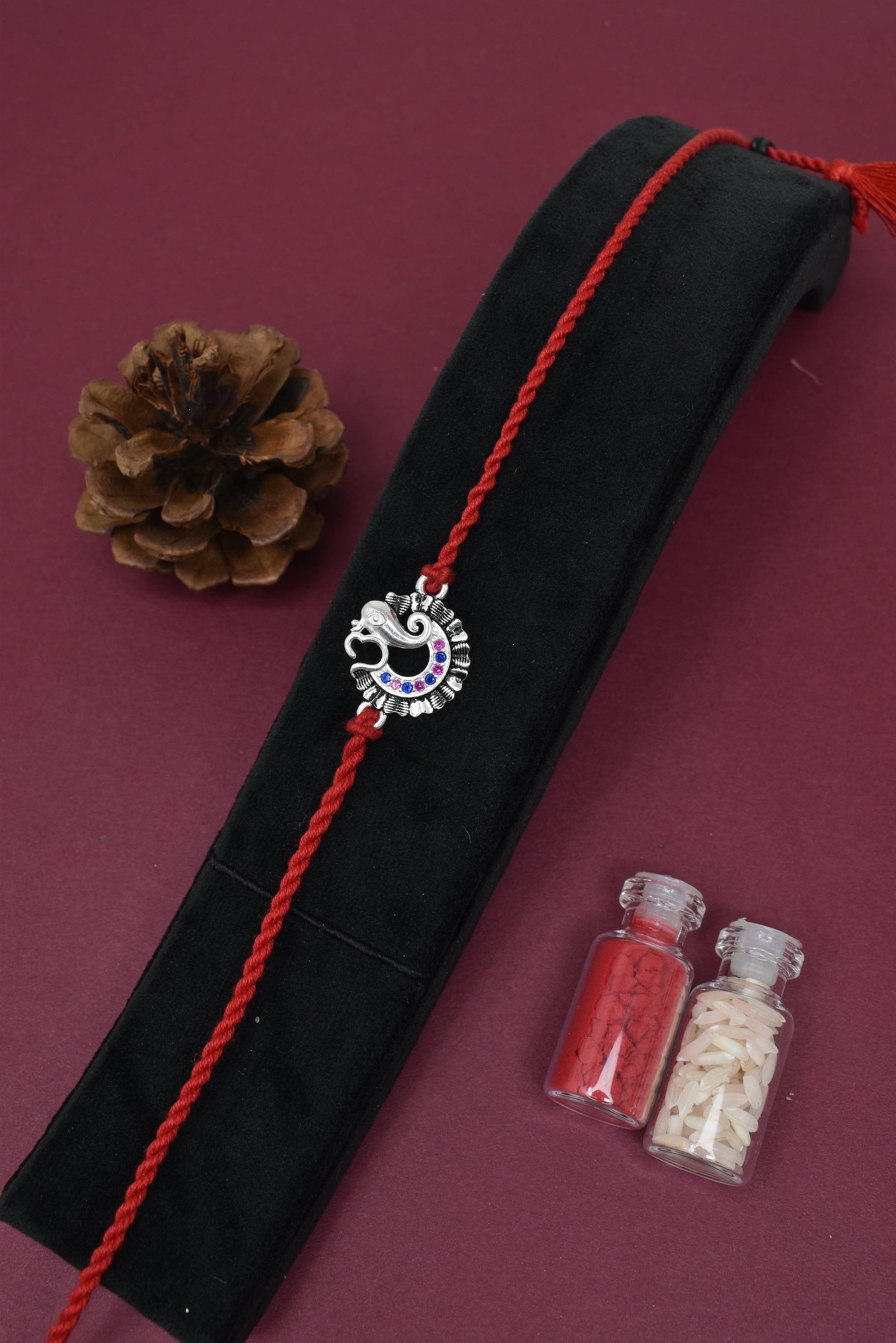  Wise Vibes – Vakratund Rakhi Design            