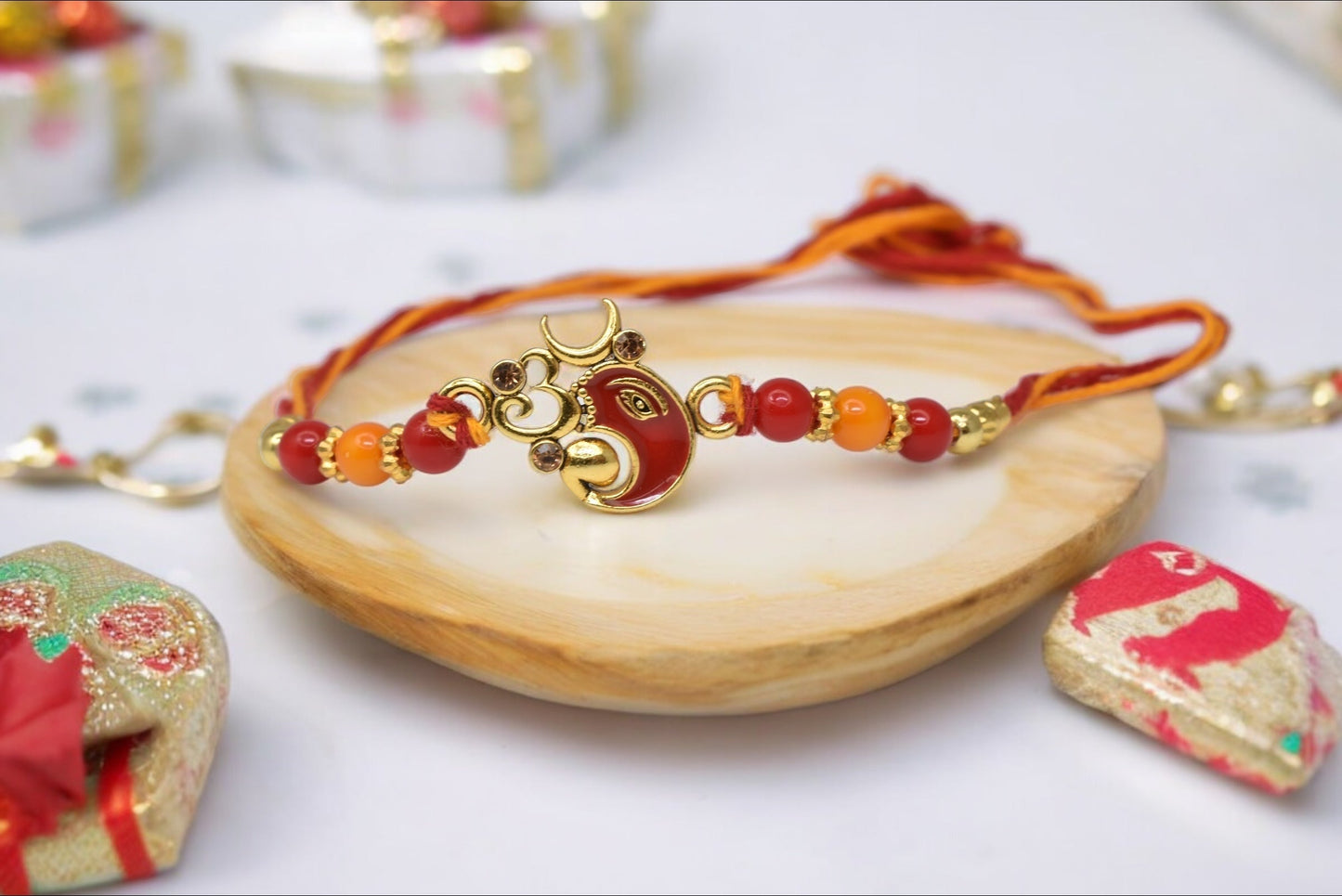 Divine OM with Lord Ganesha Rakhis1 Rakhi Made from Cotton Threds with Pack of Roli Chawal n Rakshabandhan Greetings Card |rakhi for brother|Bhaiya Rakhi | Kids rakhi |Rakhi for kids|Rakhi for Bhaiya