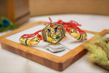 Elegant Lord Ganesh with CZ Stone Gold plated Antique rakhiSet of 2 Rakhi  Made from Cotton Threds with Pack of Roli Chawal n Rakshabandhan Greetings Card |rakhi for brother|Bhaiya Rakhi | Kids rakhi |Rakhi for kids|Rakhi for Bhaiya