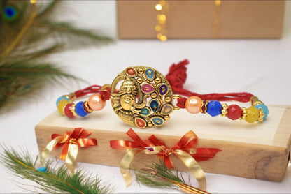 Elegant Lord Ganesh with Peacock style Gold plated Antique rakhi Set of 3 Rakhi   with Pack of Roli Chawal n Card |rakhi for brother|Bhaiya Rakhi | Kids rakhi |Rakhi for kids|Rakhi for Bhaiya