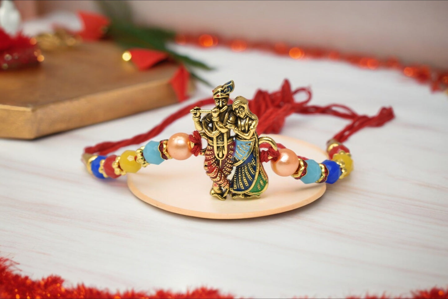 Divine Shree Radha-Krishna With Bansuri N Morpankh Gold plated Multicolored  Rakhis 1 Rakhi Made from Cotton Threds with Pack of Roli Chawal n Rakshabandhan Greetings Card |rakhi for brother|Bhaiya Rakhi | Kids rakhi |Rakhi for kids|Rakhi for Bhaiya