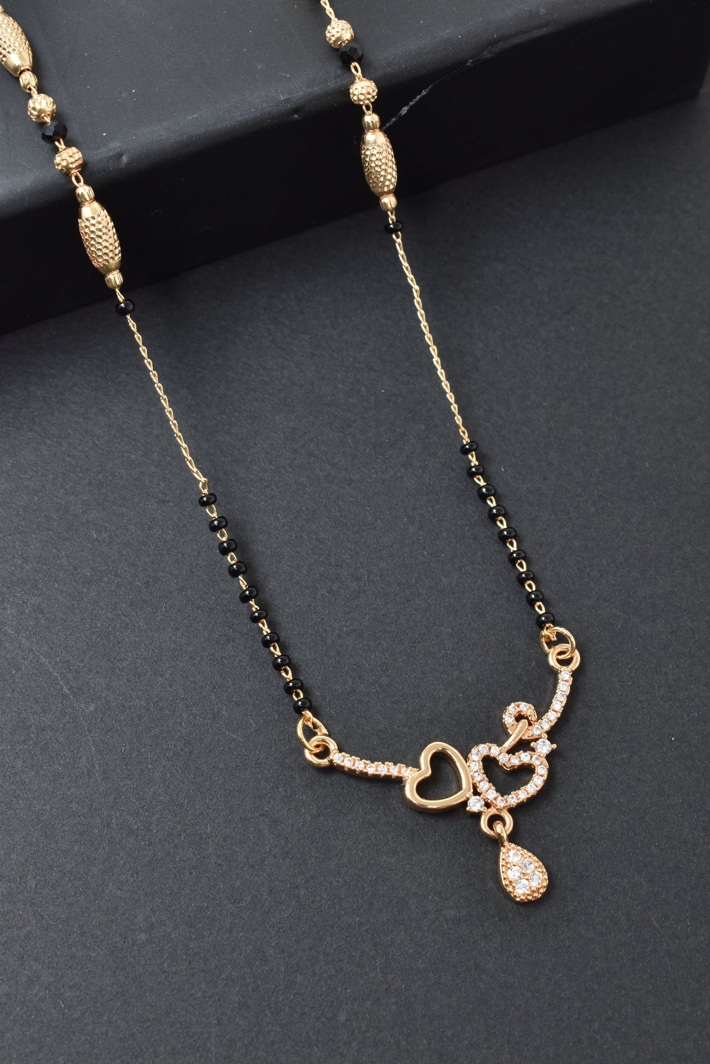 Gold Plated Mangalsutra,Artificial Mangalsutra,Daily Wear Mangalsutra,Everyday Mangalsutra for Women,Premium Quality Mangalsutra,Black Beads Mangalsutra,Long Lasting Mangalsutra,Lightweight Mangalsutra,Traditional MangalsutraStylish Mangalsutra for Women,Office Wear Mangalsutra,affordable Mangalsutra,Designer Artificial Mangalsutra,Gold Finish Mangalsutra