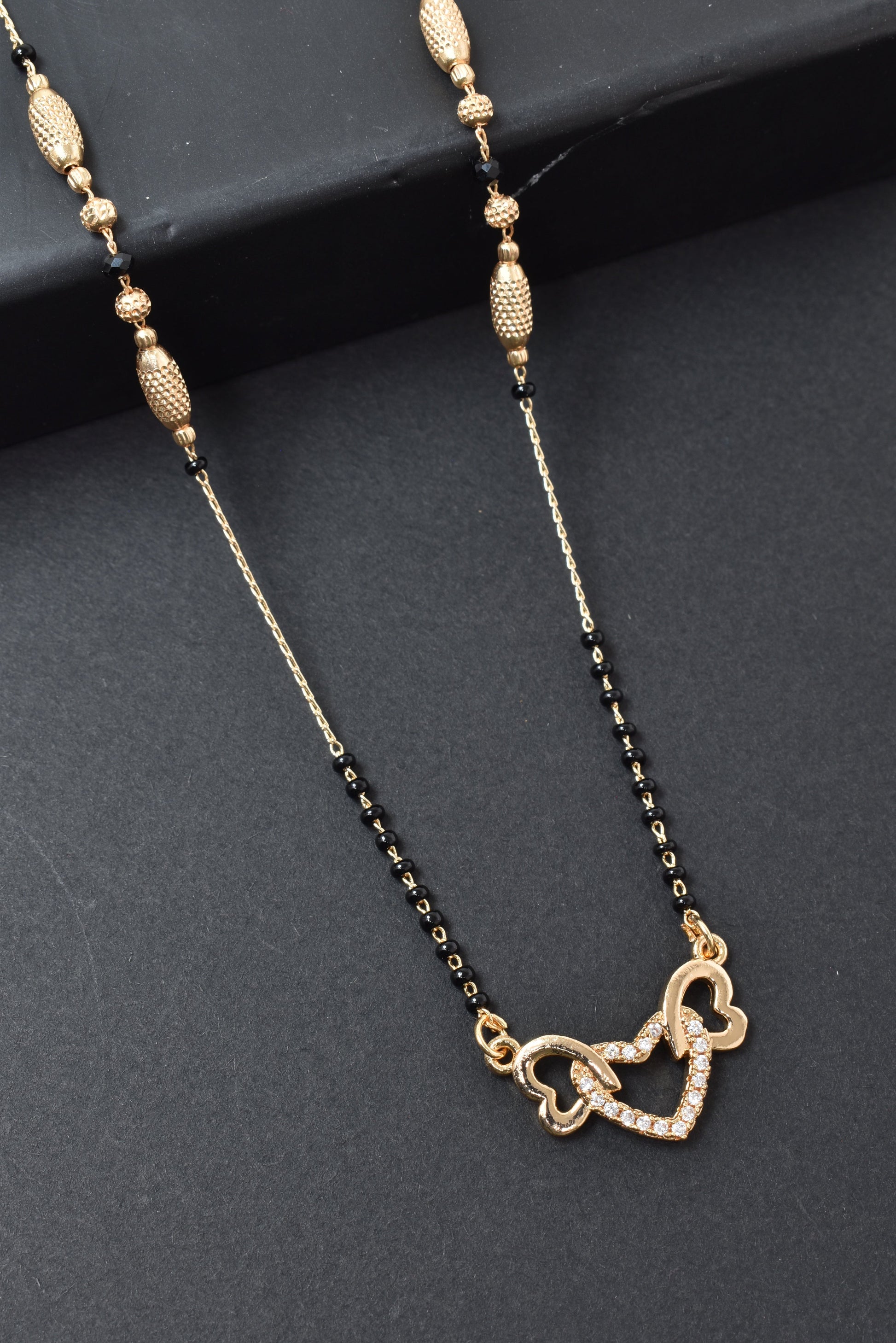 Gold Plated Mangalsutra,Artificial Mangalsutra,Daily Wear Mangalsutra,Everyday Mangalsutra for Women,Premium Quality Mangalsutra,Black Beads Mangalsutra,Long Lasting Mangalsutra,Lightweight Mangalsutra,Traditional MangalsutraStylish Mangalsutra for Women,Office Wear Mangalsutra,affordable Mangalsutra,Designer Artificial Mangalsutra,Gold Finish Mangalsutra