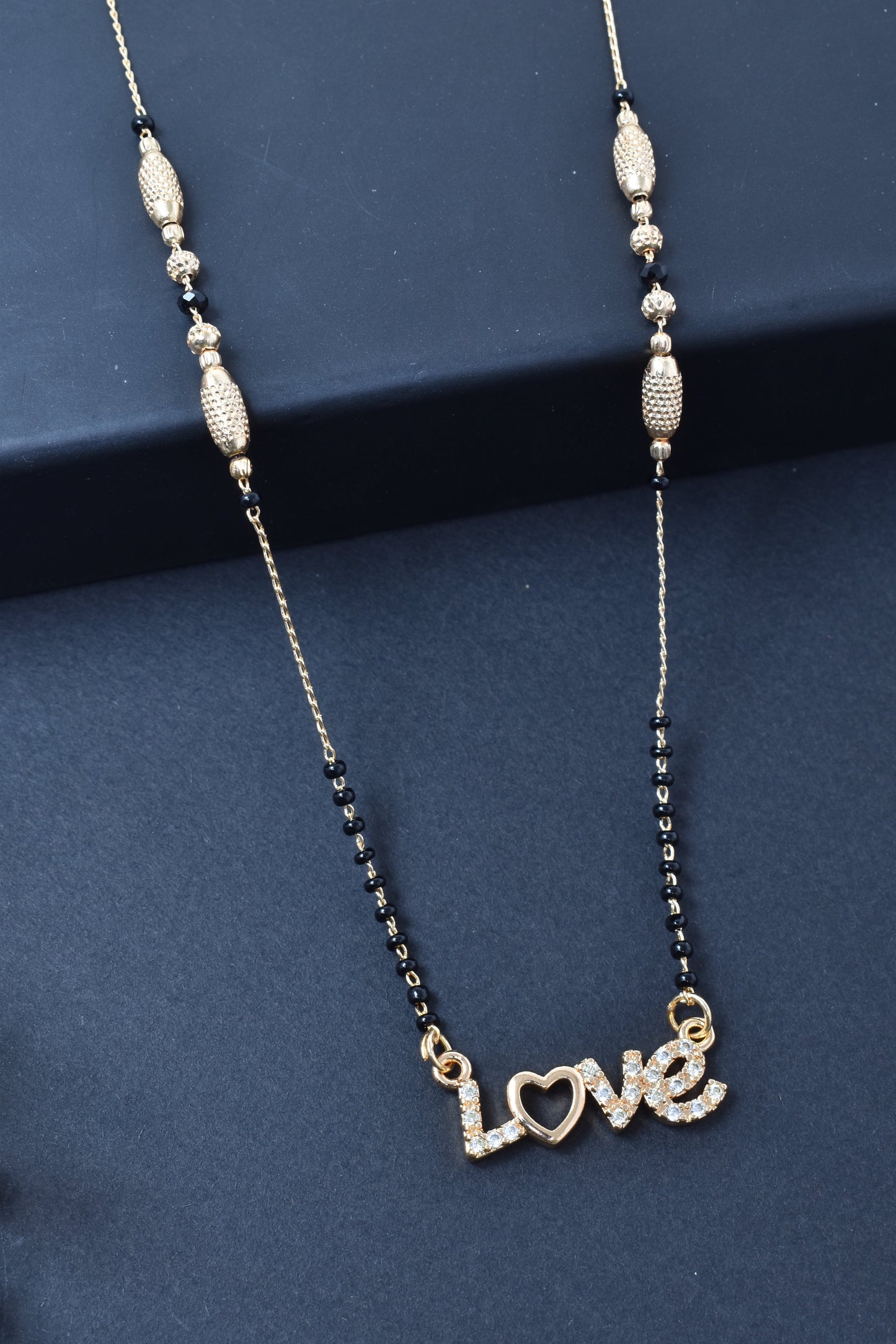 Gold Plated Mangalsutra,Artificial Mangalsutra,Daily Wear Mangalsutra,Everyday Mangalsutra for Women,Premium Quality Mangalsutra,Black Beads Mangalsutra,Long Lasting Mangalsutra,Lightweight Mangalsutra,Traditional MangalsutraStylish Mangalsutra for Women,Office Wear Mangalsutra,affordable Mangalsutra,Designer Artificial Mangalsutra,Gold Finish Mangalsutra