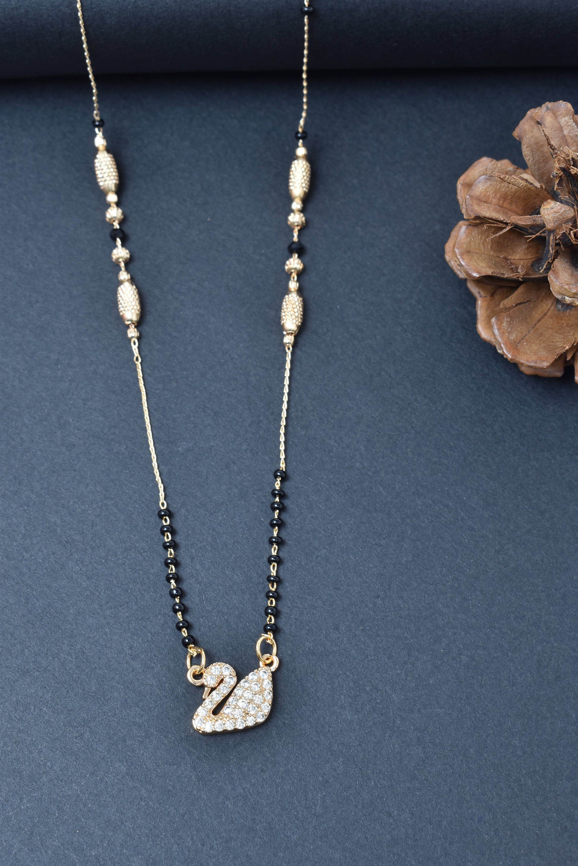 Gold Plated Mangalsutra,Artificial Mangalsutra,Daily Wear Mangalsutra,Everyday Mangalsutra for Women,Premium Quality Mangalsutra,Black Beads Mangalsutra,Long Lasting Mangalsutra,Lightweight Mangalsutra,Traditional MangalsutraStylish Mangalsutra for Women,Office Wear Mangalsutra,affordable Mangalsutra,Designer Artificial Mangalsutra,Gold Finish Mangalsutra