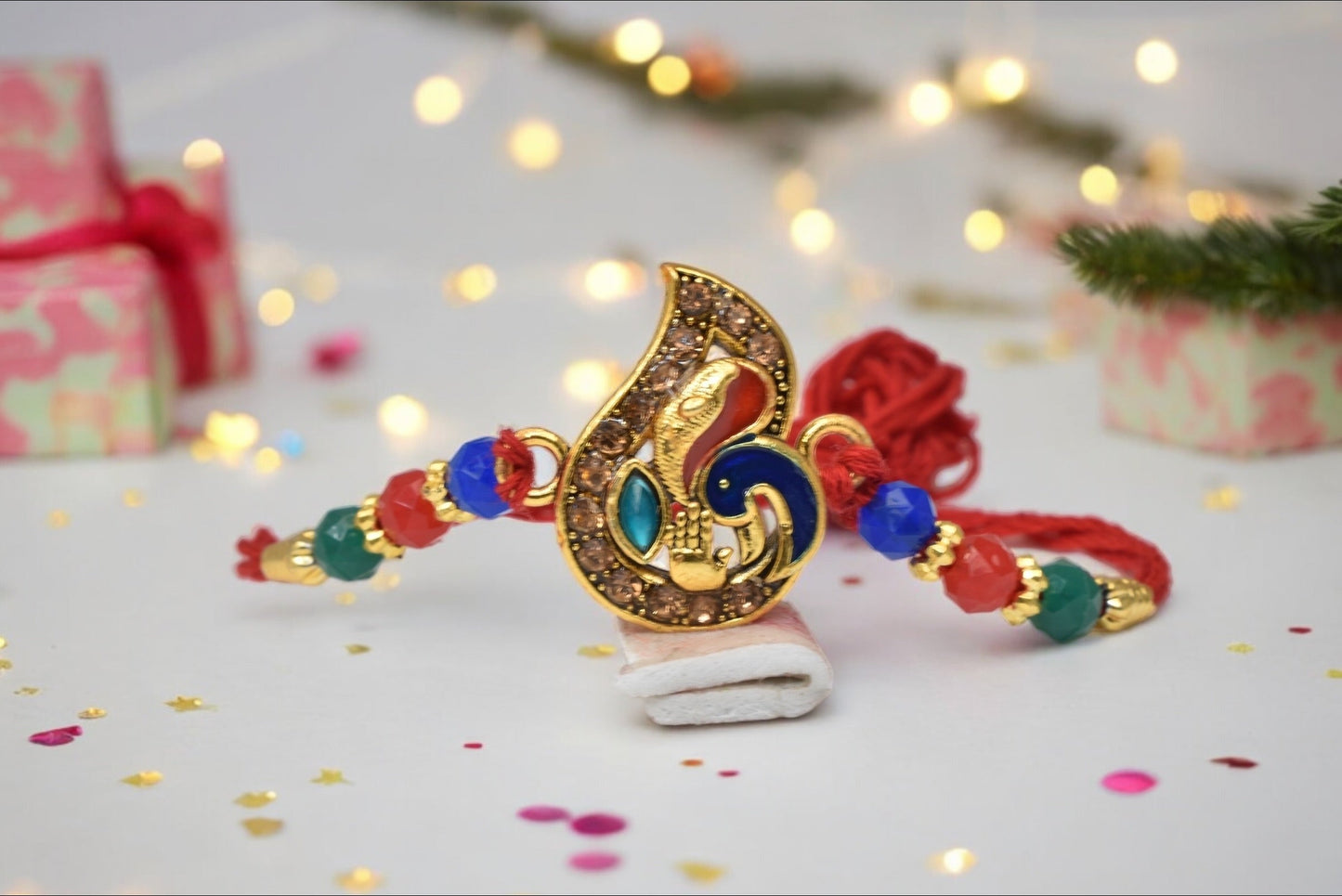 Simple n  Beautiful Leaf Style Peacock Morpaankh Kundan Stone Multicolored  Rakhis 1 Rakhi Made from Cotton Threds with Pack of Roli Chawal n Rakshabandhan Greetings Card |rakhi for brother|Bhaiya Rakhi | Kids rakhi |Rakhi for kids|Rakhi for Bhaiya