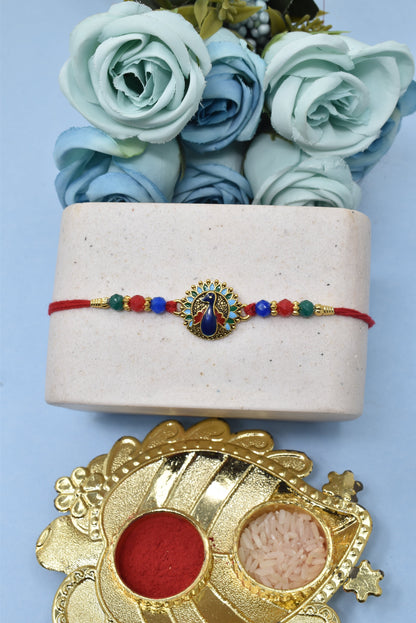 Beautiful Round Peacock on Lotus Morpaankh Kundan Stone Multicolored  Rakhis 1 Rakhi Made from Cotton Threds with Pack of Roli Chawal n Rakshabandhan Greetings Card |rakhi for brother|Bhaiya Rakhi | Kids rakhi |Rakhi for kids|Rakhi for Bhaiya