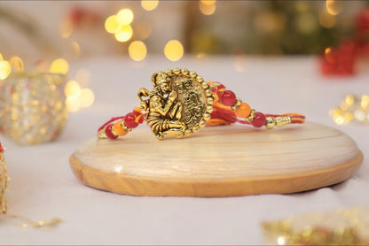 Elegant Lord Ganesh with Green n Red Lotus  Gold plated Antique rakhisSet of 2 Rakhi  Made from Cotton Threds with Pack of Roli Chawal n Rakshabandhan Greetings Card |rakhi for brother|Bhaiya Rakhi | Kids rakhi |Rakhi for kids|Rakhi for Bhaiya