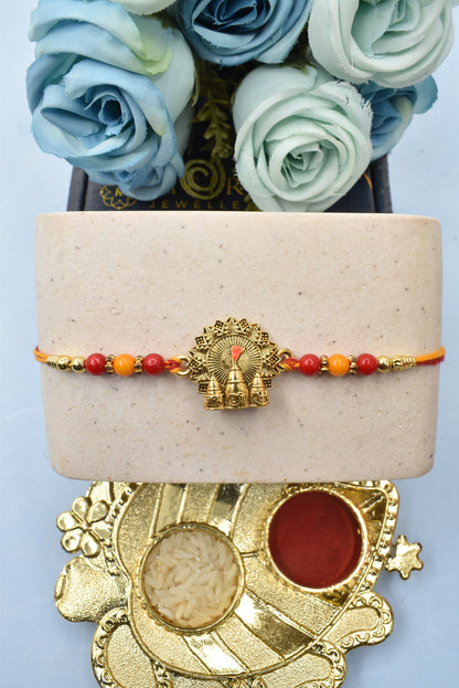 आध्यात्मिक जय श्री राम पीतल की गोल्ड प्लेटेड राखी, दिव्य गोल्डप्लेटेड बहुरंगी राखी, रोली चावल और रक्षाबंधन ग्रीटिंग कार्ड के पैक के साथ सूती धागों से बनी 1 राखी | भाई के लिए राखी | भैया राखी | बच्चों की राखी | बच्चों के लिए राखी | भैया के लिए राखी