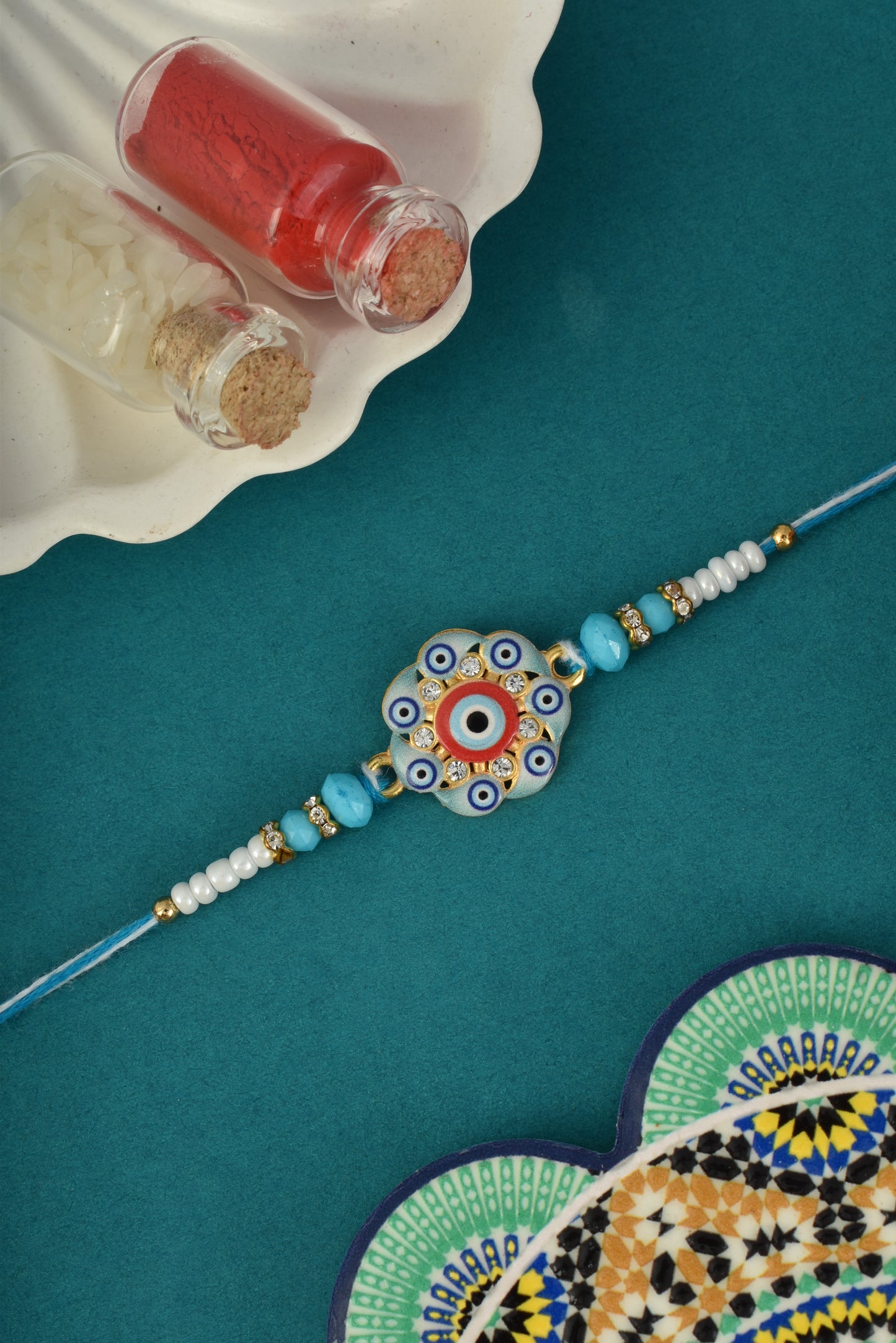 Evil Eye Design Pink Blue Rakhi for Brother