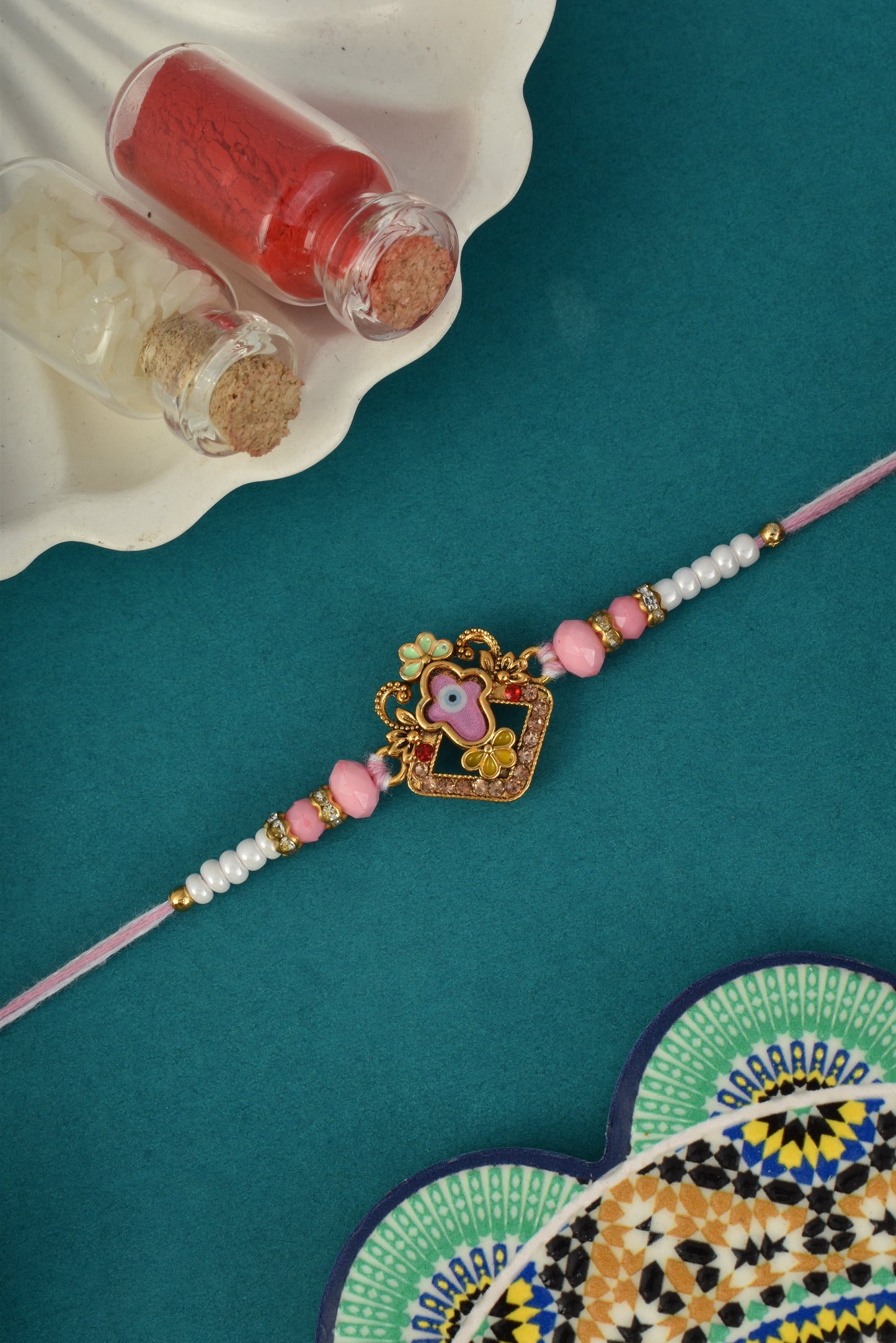 Designer Evil Eye Pink Rakhi for Brother