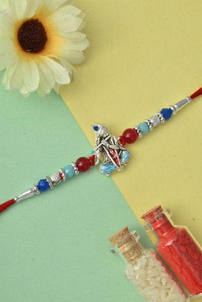 Silver plated rakhi
