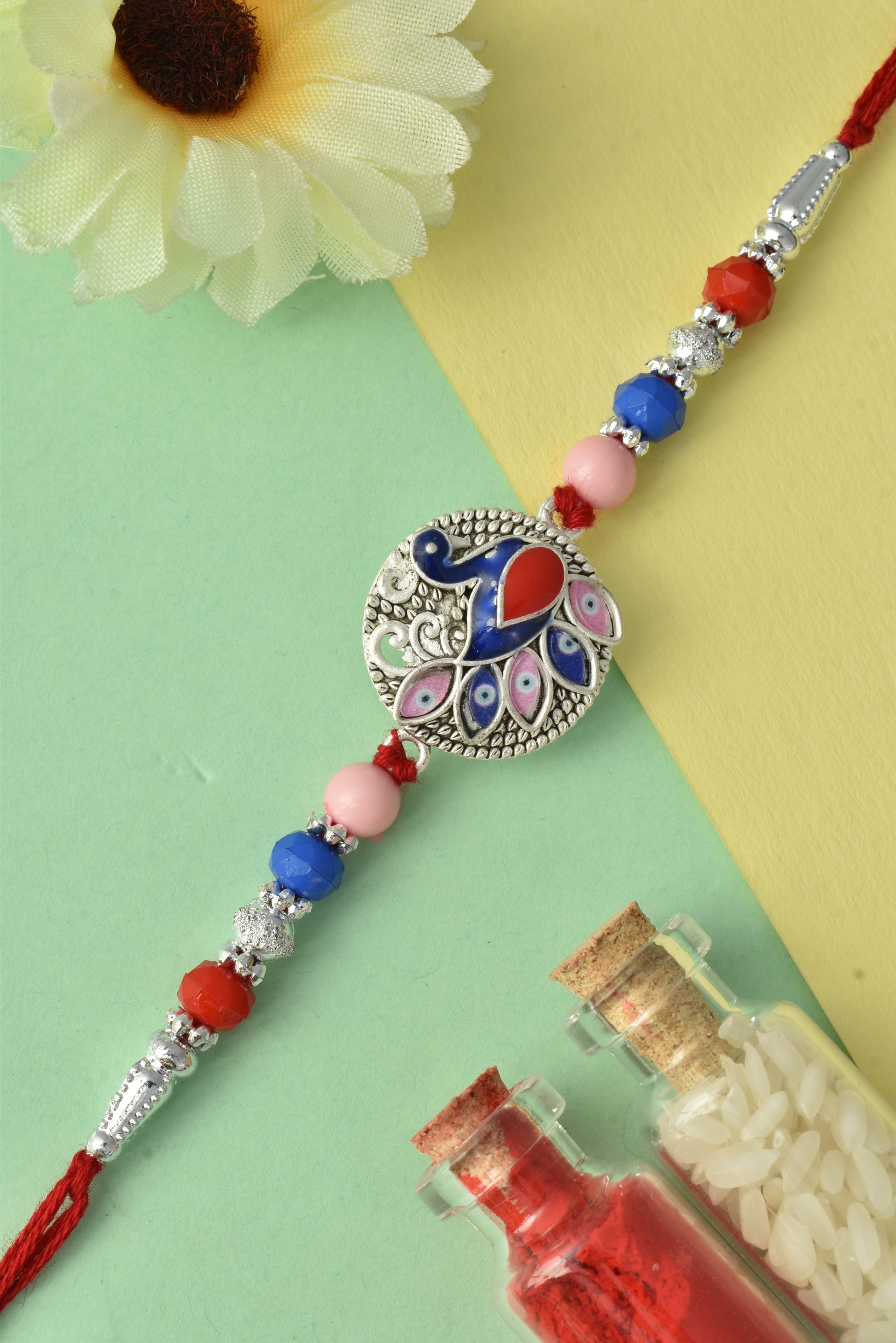 Silver plated rakhi