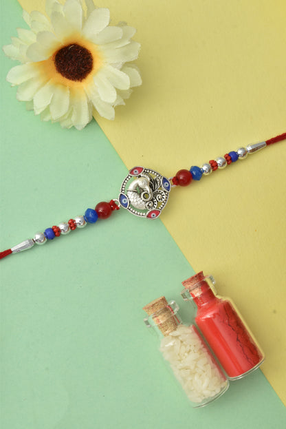 Silver plated rakhi