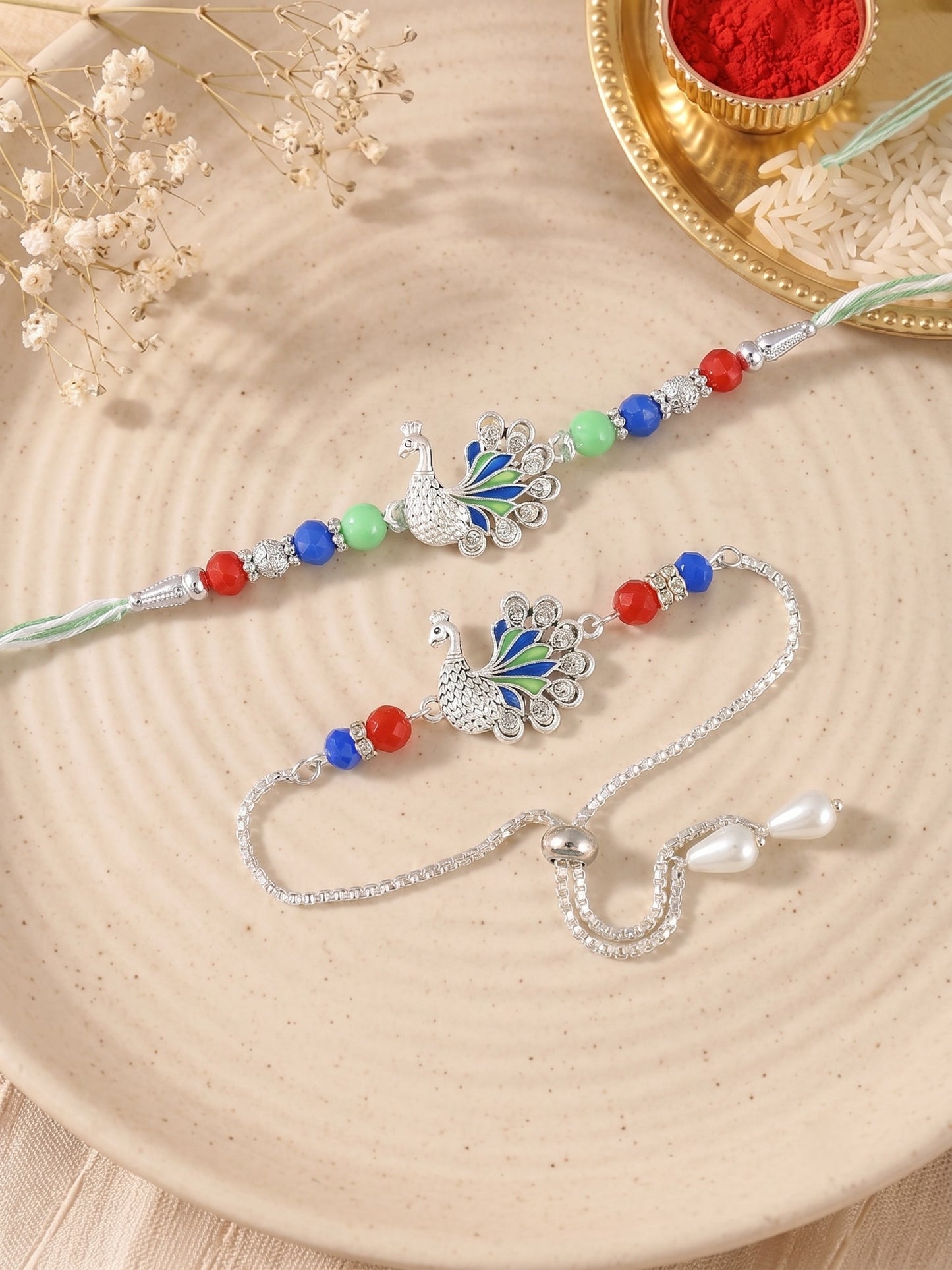 Premium Silver-Plated Peacock Design AD Studded Beaded Bhai and Bracelet Type for Bhabhi