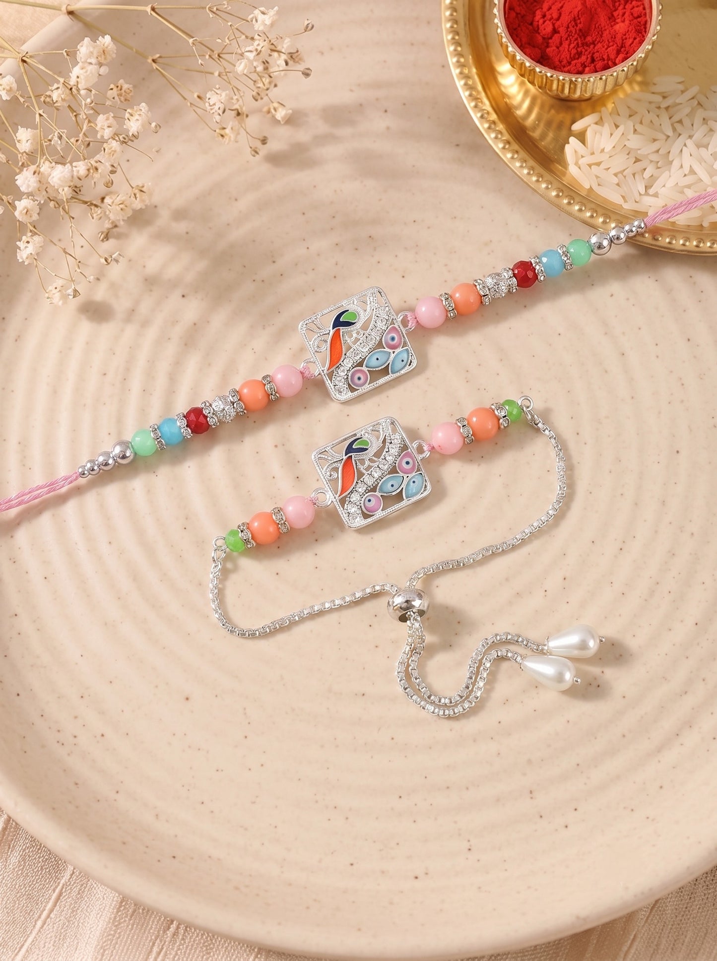 Premium Silver-Plated Peacock Design AD Studded Beaded Bhai and Bracelet Type for Bhabhi