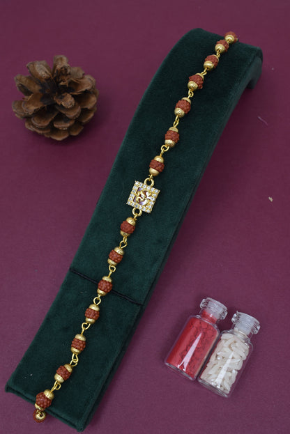 Goldplated AD Studded Om  Rudraksh Bracelet Rakhi