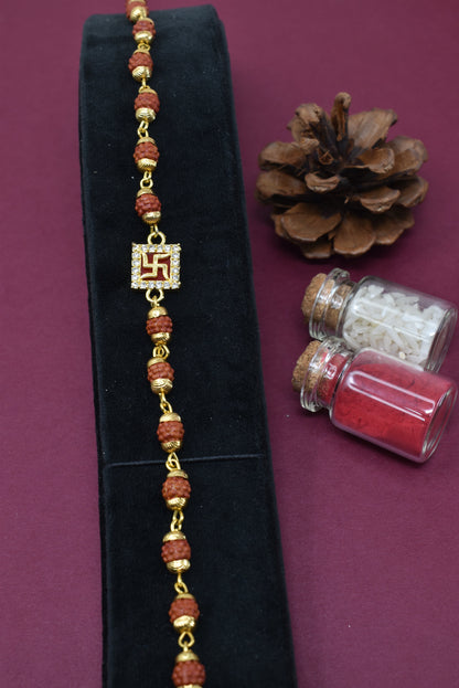 Elegant Goldplated Rudraksh Swastik Bracelet Rakhi