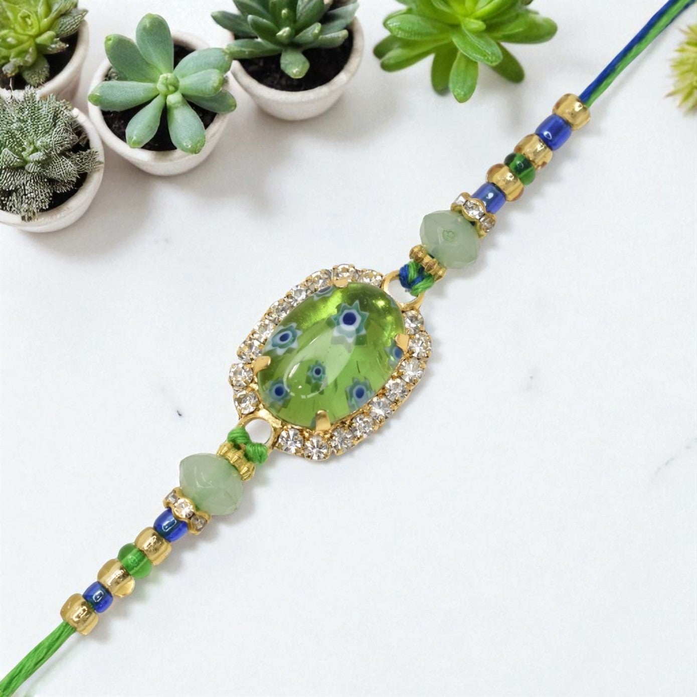 Resin Style AD Studded Heavy Designer Rollstone Green Rakhi