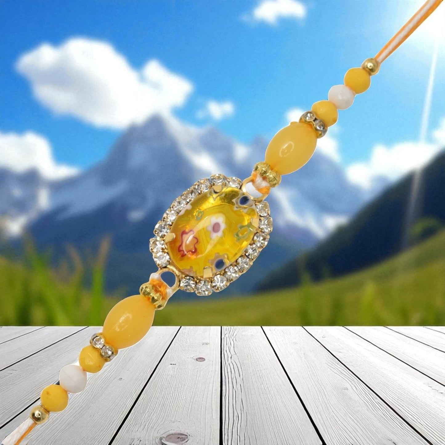 Resin Style AD Studded Heavy Designer Rollstone Yellow Rakhi
