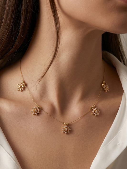 Gold-Toned Delicate Charm Wire Necklace with Sparkling Floral Motifs