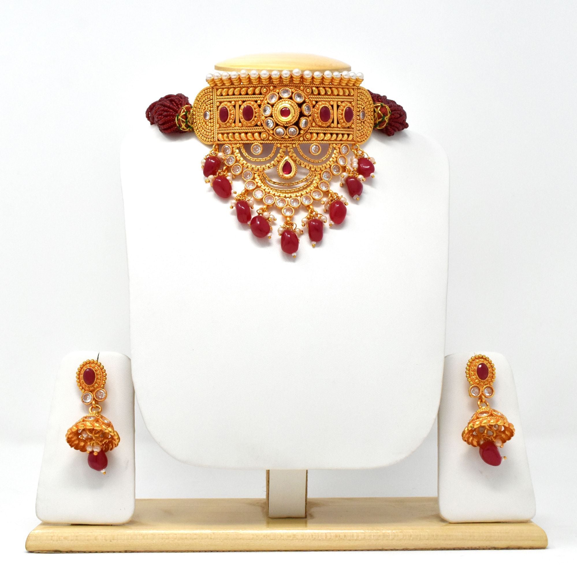 Gold Plated Rajputi Aad studded with Beads and Pearls.