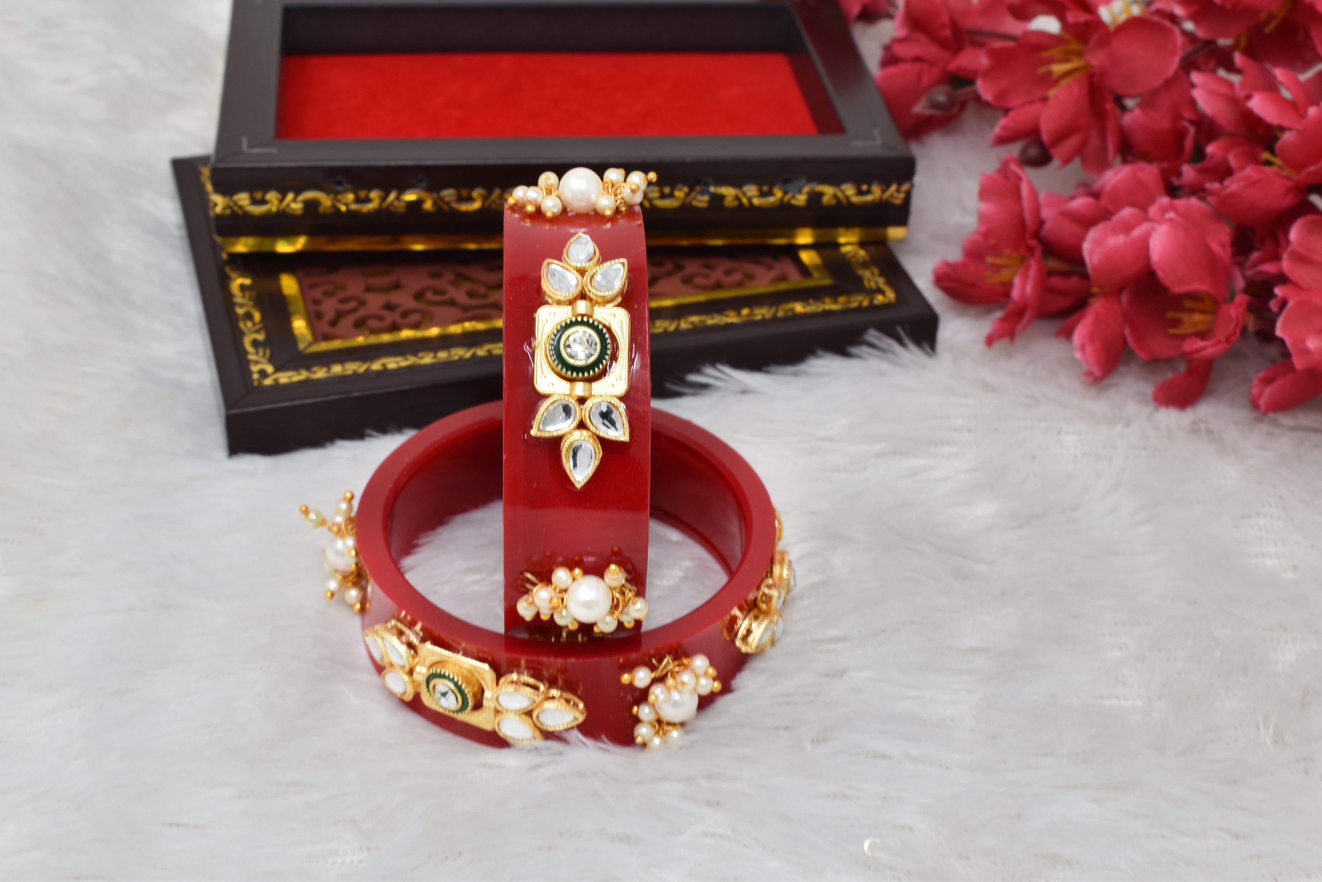 Plastic bangles studed with kundan and pearl work