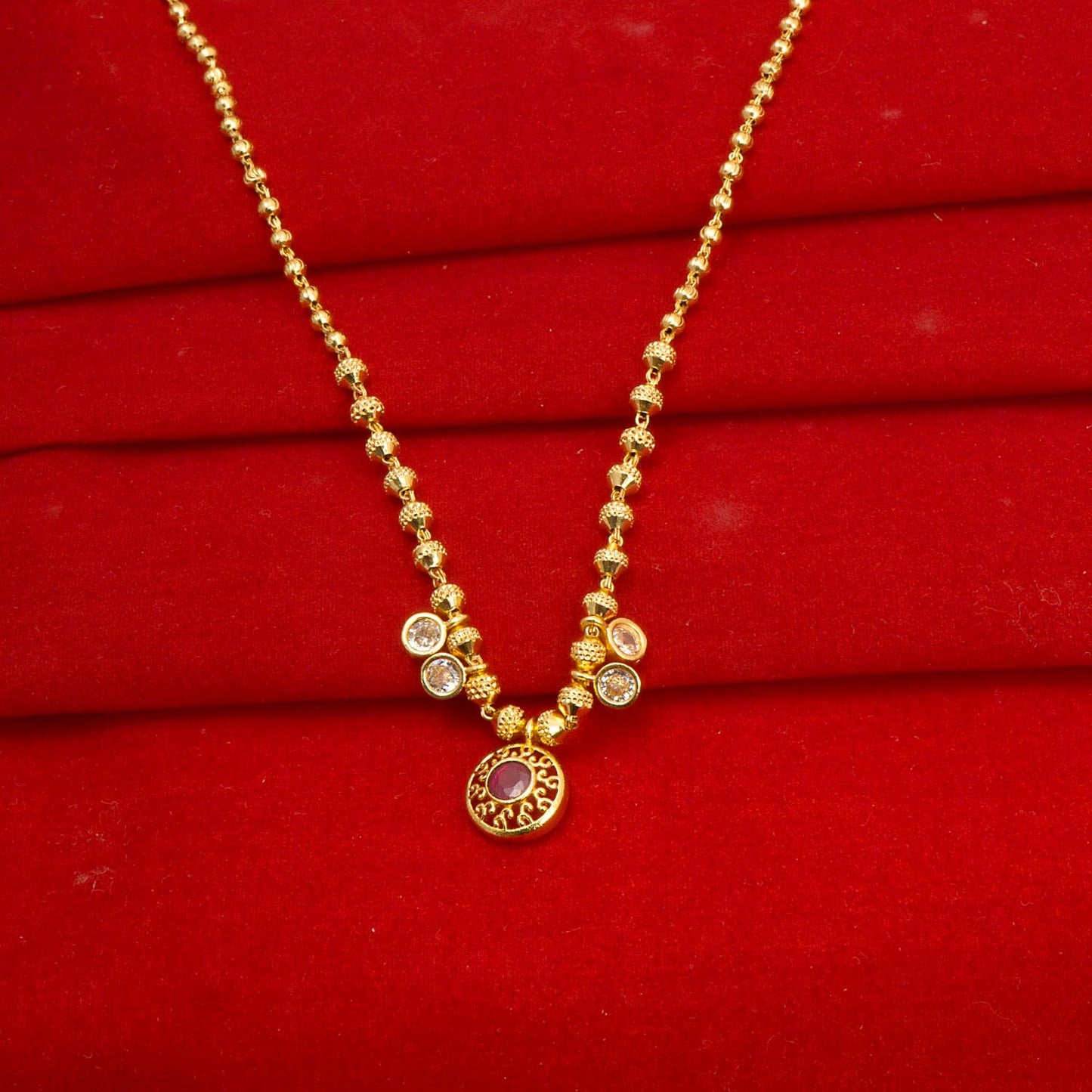 Designer Gold Plated Round shape pink color pendant Neckwear.